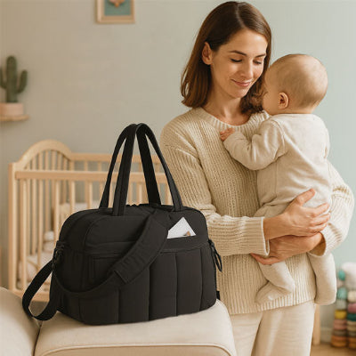 bebe bras maman sac a langer table