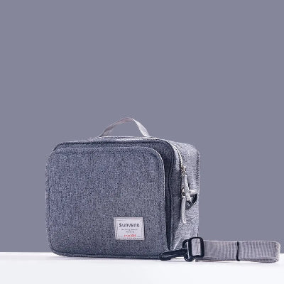 sac a langer compact gris